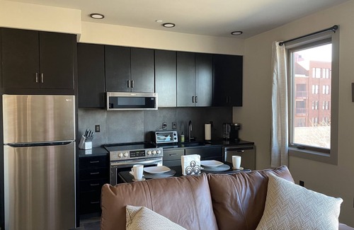 Traverse City Condo | Fantastic Top Floor Condo for 2 in the Heart of Downtown Traverse City W/Parking