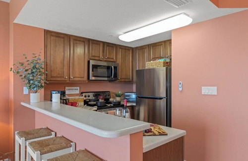 Lower Grand Lagoon Condo | Feeling Beachy? Your beach front escape awaits & only steps to white sugar sands