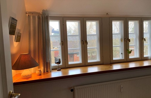 Suderende Apartment | Ferienwohnung Apfelrose - Urlaub im Malerischen Inseldorf Oldsum