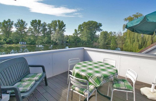 Knielingen Apartment | Ferienwohnung mit großer Terrasse am Privatsee