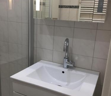 Heiligenhafen Apartment | Ferienwohnung Sandküste mit Strandkorb & Indoor Spielplatz