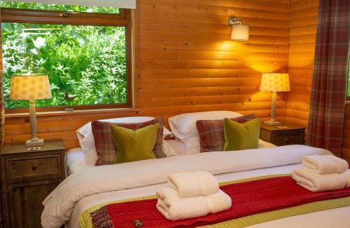 St. Florence House | Fiddlers Green Log Cabin Tenby