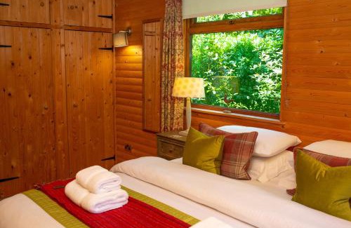 St. Florence House | Fiddlers Green Log Cabin Tenby