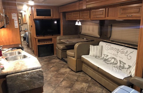 Hereford House | Find Serenity In Our Fully Stocked Class A RV