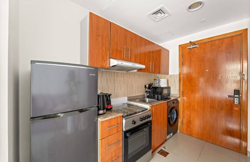 Dubai Production City Apartment | FIRST CLASS | Studio | Cozy & Chic Retreat