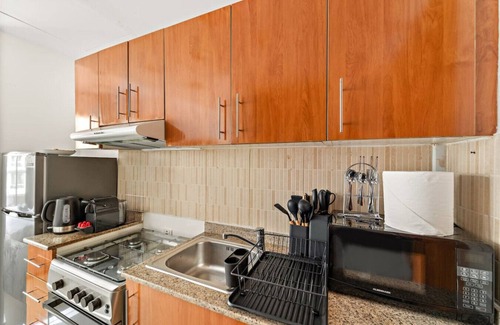 Dubai Production City Apartment | FIRST CLASS | Studio | Cozy & Chic Retreat