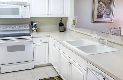 Biggar Condo | FIRST FLOOR LEGENDS 2BR, 2 BATH, DEN GARDEN HOME CONDO WITH GOLF PRIVILEGES INCD