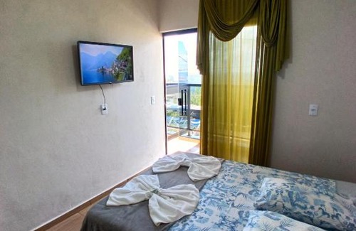 Sao Thome das Letras Apartment | Flat 02 com Varanda - Avenida Hospedagem