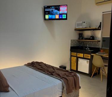 Jardim Ipe Apartment | Flat com ar e varanda com linda vista para o Ibituruna - Véu de Noiva 204