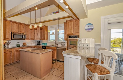 South Beach House | Flip Flops overlooks the signature hole of the golf course and has a beautiful view of the ocean!