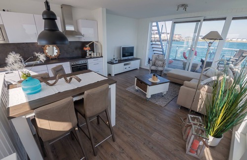 Olpenitz House | Floating vacation home Antares One by Seeblick Ferien ORO, all around water