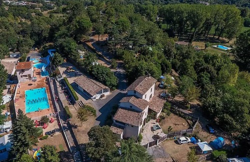 Anduze Ski Chalet | Flower CAMPING FAUVETS * - Chalet NEMO Standard 22m2 (2 bedrooms) + covered terrace 7m2 + CLIM 4 persons