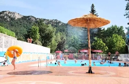 Anduze Ski Chalet | Flower CAMPING FAUVETS * - Chalet OTTAWA Premium 33m2 (3 bedrooms) + covered terrace 14m2 + Air conditioning + LV + Plancha 6 persons