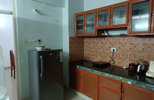 Kannur Apartment | Forget your worries in this spacious and serene space. Wind down RECHARGE !n