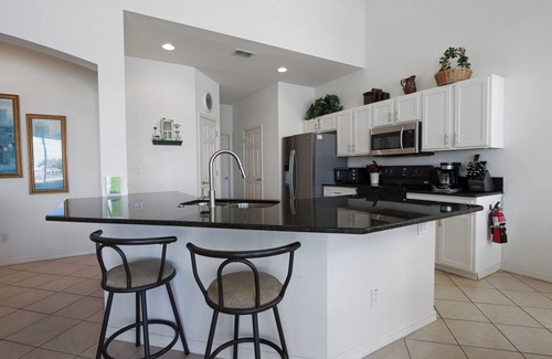 Iona House | Fort Myers Weekly Vacation Home Rental with Pool – Halcyon Days