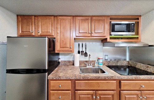 Daytona Beach Shores Condo | FREE DAILY ACTIVITIES! Corner Unit w/Private Balcony to Catch the Action Overlooking City & Ocean!