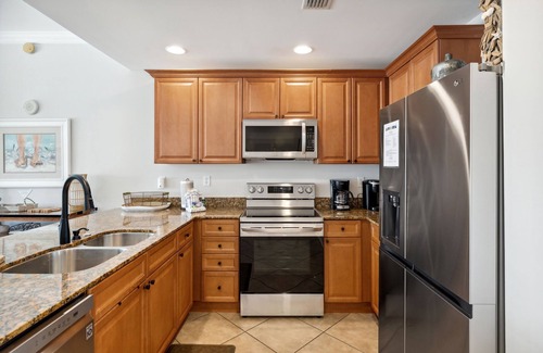 Upper Grand Lagoon Condo | FREE Golf & Tix! Reflections 304, 2 King Beds, Heated Resort Pool & Hot Tub!
