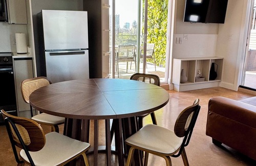 Near East Side Apartment | Fresh & Modern: New Apartment with Rooftop and Stunning Views