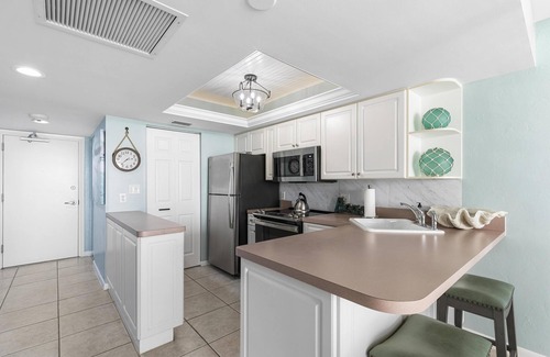 Marco Island Condo | Full Reno: Pristine Cozy Beachfront Condo: SW1702-best location Discounts Promos