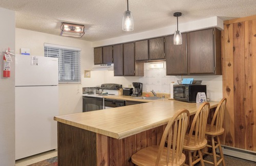 Winter Park Condo | Fully equipped kitchen, updated interior in this cozy condo
