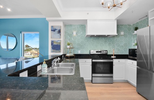Panama City Beach Condo | Fully Remodeled - Sweeping Views - Spacious 2BR/2BA - Bar/Coffee Shop Downstairs