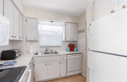 Siesta Key Condo | Fully Remodeled, 1st Floor End Unit | Lanai just steps from the Heated Pool | Near Crescent Beach