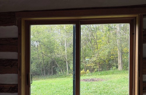 Saukville House | Fully restored 1855 Log Cabin, a modern-rustic retreat
