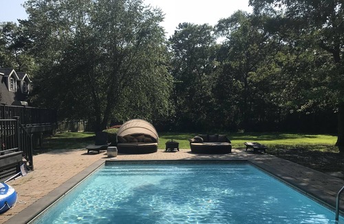 East Quogue House | Fully Updated East Quogue 5BR home with Heated Pool on acre with large deck