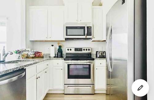 Thomas Drive House | Game Room, mins to beach, Pier Park and Sports Complex, POOL, pond view