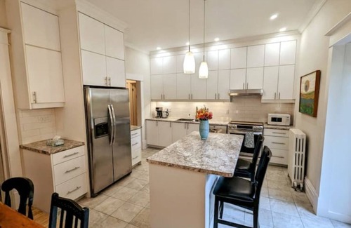 Exhibition Park House | Garden Paradise: Century Home in Guelph's Heart