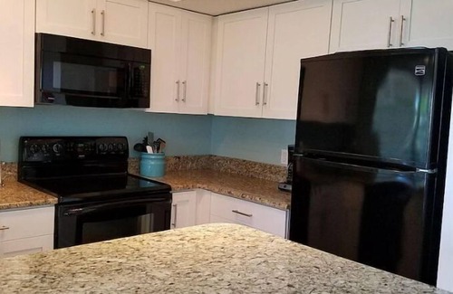 Miramar Beach Cottage | Gated community, Overlooking Tennis Courts, Close to Pool and beach