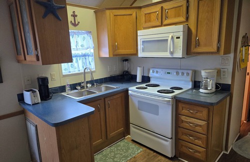 Upper Grand Lagoon Cottage | Gated. great for families and winter guests Other units inquire if unit booked