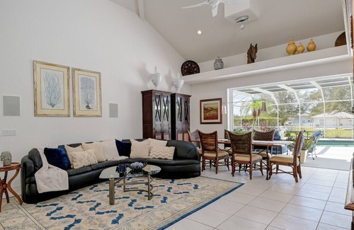 Biggar House | Gated pool home- tennis & basketball, near shops, beach, and more in Fort Myers!