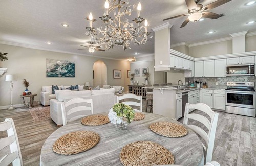 Seacrest House | Giant Backyard Oasis with Heated Private Pool, Fire Pit, and Outdoor Lounge