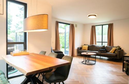 Ewijk House | Goldenescape 6P Vip huis met Royale tuin en hottub 110