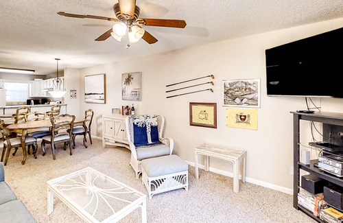 Colonial Charters Condo | Golf course community condo with fairway views, on-site pool, & balcony