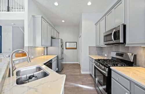Reunion House | Golf course view - Wood floors, DVR, pool hot tub, movie theatre, resort pools.