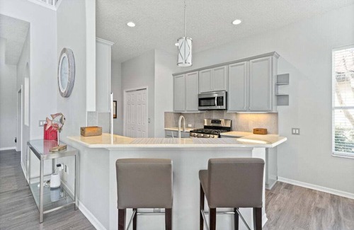 Reunion House | Golf course view - Wood floors, DVR, pool hot tub, movie theatre, resort pools.