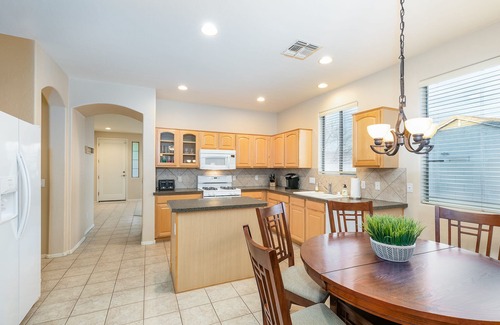 Legacy House | Golf Front Home with Mountain Views, Heated Pool, Fun Game Room, BBQ, VR Tour