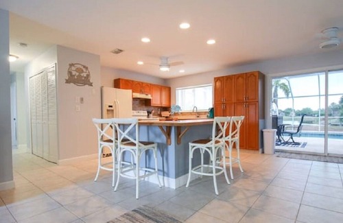 South Gulf Cove House | Gorgeous 3 BR / 2 BA home with heated pool on the canal. Sleeps 6