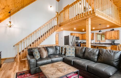 Eagle River House | Gorgeous lake home with private pier, beach, firepit, deck, & grill + water toys