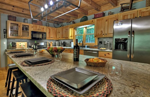 Ellijay Cabin | Gorgeous river front cabin rental with tons of outdoor space, hot tub and firepit