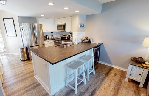 Isle of Palms Condo | Gorgeously decorated ocean view villa with a private porch and beach access