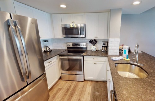 Isle of Palms Condo | Gorgeously decorated ocean view villa with a private porch and beach access