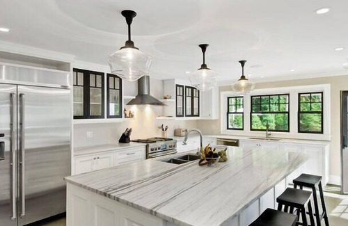 Wainscott House | Gourmet Kitchen with Stainless Appliances and Breakfast Bar, Furnished.
