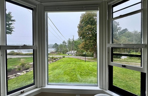 Isle of Springs House | Gracious 4-bedroom house in Southport on Townsend Gut with a private pond.