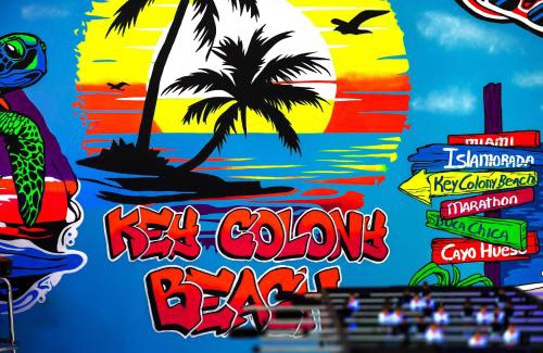 Key Colony Beach House | Grand Blue Arenas with Minigolf, Canal, Game Room, 3 Bedrooms and Heated Pool