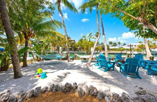 Key Colony Beach House | Grand Blue Arenas with Minigolf, Canal, Game Room, 3 Bedrooms and Heated Pool