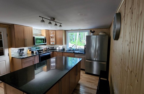 Laconia House | great location weirs beach area rental