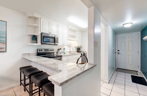 Miramar Beach Condo | Ground-floor condo with patio, pool, central AC & beach across the street